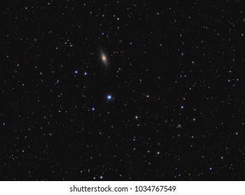 "Little Sombrero" spiral galaxy (NGC 7814) in constellation Pegasus, 40 million light-years away from Earth - Powered by Shutterstock