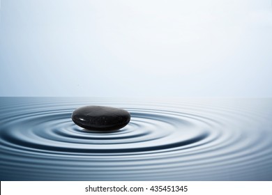 A little stone in water