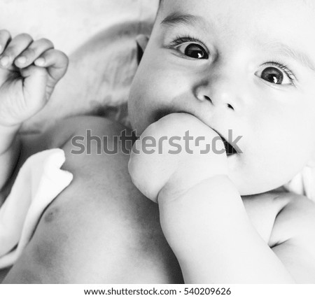 Similar – Closeup  of baby girl with pacifier sleeping