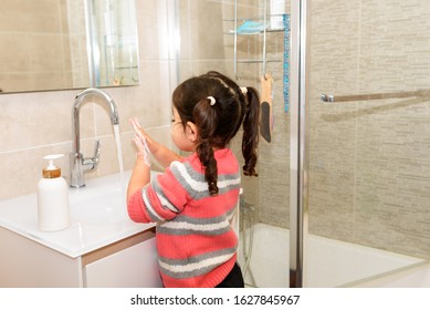 Little Toddler Black Hair Girl Washing Hands. Protect Recommendation: To Keep The Virus At Bay, Wash Your Hands With Soap And Water Several Time.