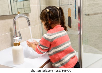 Little Toddler Black Hair Girl Washing Hands. Protect Recommendation: To Keep The Virus At Bay, Wash Your Hands With Soap And Water Several Time. Selective Focus On Hands.