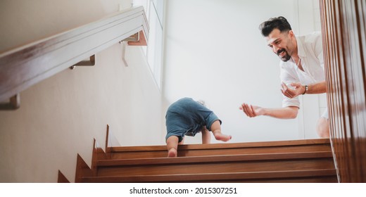 Little Toddler Children With First Walk Step With Stairs At Home, Small Baby Person Are Happy To Play And Learn To Crawling With Family, Cute Infant Boy Having Fun And Childhood Care