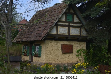 Little Toy House Looking Like A Farm House In The Amusement Park Tripsdrill, Southern Germany