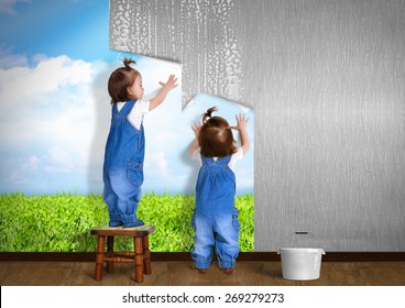 Little Twins Doing Repair At Home, Hanging Wallpaper. Renovation Concept.