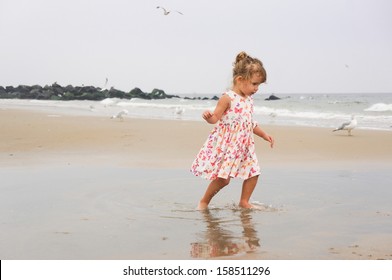 Little Two Year Old Girl At The Beach