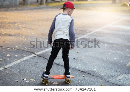 Similar – Image, Stock Photo teenager practicing with skateboard at sunrise city