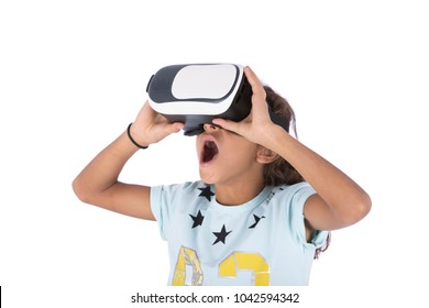 A little VR glasses player looking up with an open mouth looking surprised, isolated on a white background. - Powered by Shutterstock