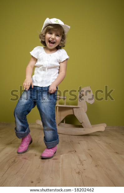 little girl rocking horse