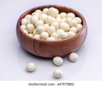 Little White Chocolate Ball With Raisin Inside - Stock Image