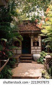 Little Wooden House In The Middle Of A Lush Garden