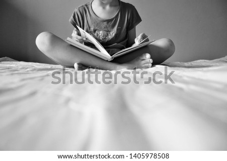 Similar – young caucasian little boy playing with tablet on couch