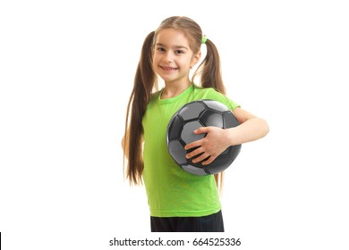 Little Young Girl With Soccer Ball In Hand Smiling On Camera Isolated On White Background