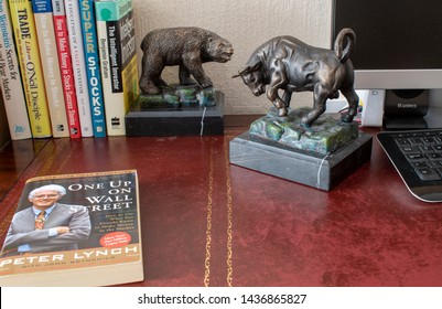 Littlehampton, West Sussex, England, June 28, 2019, Illustrative Editorial of Classic Investment Books. and the Bull and Bear figurines. William O'Neal books feature.