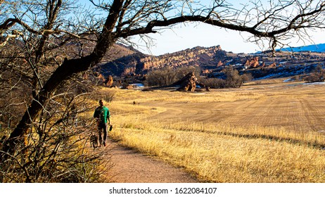Littleton, Colorado, USA, 1/19/2020 hikers on Swallow trail looking south in South Valley Park in the afternoon