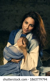 Live Christmas Nativity Scene In An Old Barn - Reenactment Play With Authentic Costumes.  The Baby Is A Doll.