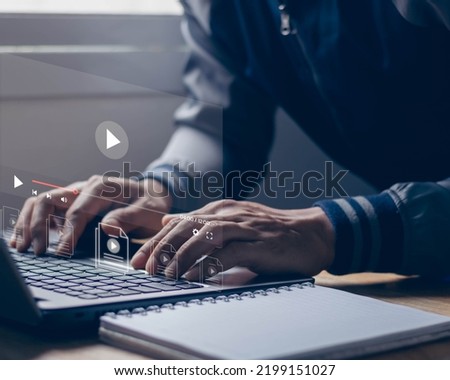 Live digital stream multimedia player on virtual screen. Man using laptop computer for watching live stream. streaming online, watching video on internet, live concert, show, tutorial, content online.