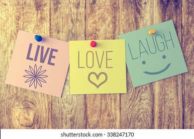 Live Laugh Love On Wooden Background