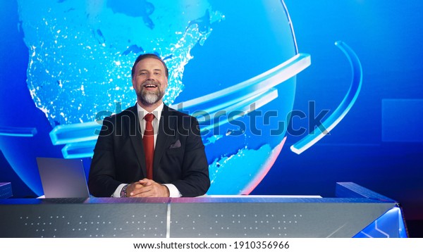 Live News Studio with Charismatic Male Newscaster\
Having Fun. Talk Show Host Telling Joke and Laughing. TV\
Broadcasting Channel with Presenter, Anchor Talking. Mock-up\
Television Channel Newsroom\
Set