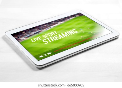 Live Sport Stream Online With Mobile Device. White Tablet On Wooden Table With Imaginary Video Player And Streaming Service.