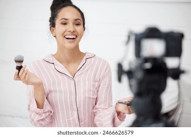 Live stream, makeup tutorial and influencer woman in living room of home as freelance or startup entrepreneur. Beauty, small business and video camera with young person streaming cosmetics broadcast