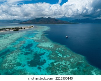 A Liveaboard Dive Boat Drifts Along The Edge Of A Reef At Pulau Besar, North Of Flores, Indonesia. This Region Is Known For Its High Marine Biodiversity And Spectacular Scuba Diving And Snorkeling.