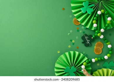 Lively celebration top view snapshot: gold coins, dynamic fans, shamrocks, confetti, and beads necklace strewn on a vibrant green surface with unoccupied space for your text or advertisement - Powered by Shutterstock