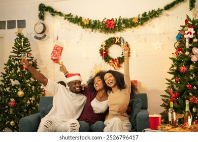 A lively Christmas celebration with three african friends enjoying drinks and holiday cheer on a sofa. The festive atmosphere includes Christmas trees, wreaths, lights, and decorations. - Powered by Shutterstock