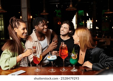 A lively gathering where colleagues are sharing laughs and drinks at a corporate celebration. - Powered by Shutterstock