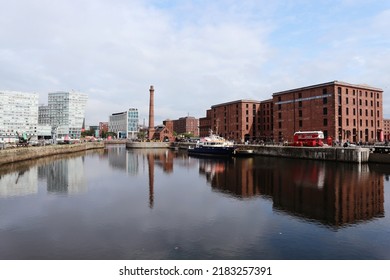 Liverpool, England- August 20th, 2018: Beautiful Sunny Morning And Smooth River Surface At Liverpool`s Albert Dock, In Foreground Brick Building Of Tate Modern