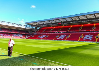 LIVERPOOL - ENGLAND, MAY 12,2019 : A Local guide at Anfield Stadium, the home ground of Liverpool Football Club.