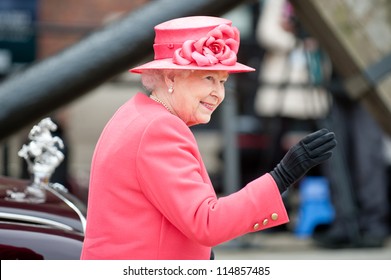 LIVERPOOL, ENGLAND - MAY 17 2012: Her Royal Highness Queen Elizabeth II visits Liverpool Albert Dock during her Diamond Jubilee tour of Great Britain, Liverpool, England. May 17 2012