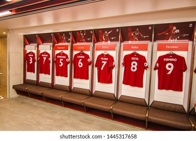 LIVERPOOL - ENGLAND, MAY 18, 2019 : Player's jerseys hung in front of lockers in the changing room at Anfield stadium the home ground of Liverpool Football Club
