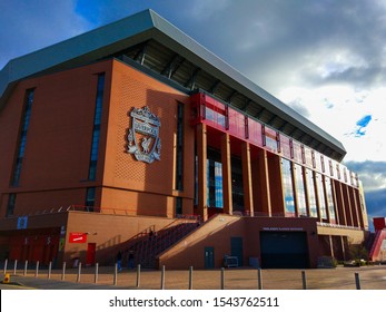 Liverpool, England, United Kingdom; 10/15/2018: Facade of the building of Anfield Stadium with the badge of Liverpool FC and the players entrance