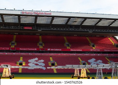 Liverpool, England, United Kingdom; 10/15/2018: Empty Red Steps Or Terraces Of Sir Kenny Dalglish Stand In Anfield, Liverpool's FC Stadium, During A Tour