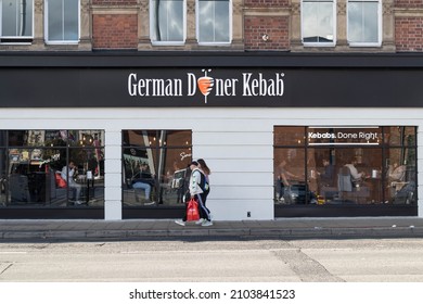 Liverpool, Great Britain - September 21st, 2021 :Exterior Outside Of German Doner Kebab Cafe Restaurant Viewed From The Street With People Walking Past