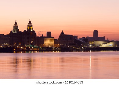 LIVERPOOL, MERSEYSIDE/ENGLAND - MARCH 02 2013: Liver buildings in the Liverpool skyline at sunrise, England