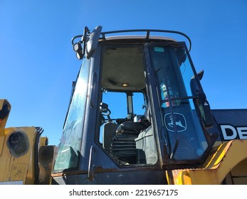 Liverpool, NS, CAN, October 28, 2022 - A Closeup Look At The Cab Of A Bulldozer Through The Open Door.