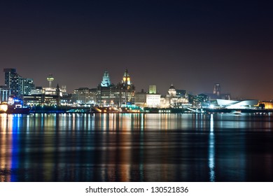 Liverpool reflecting on the river Mersey by night