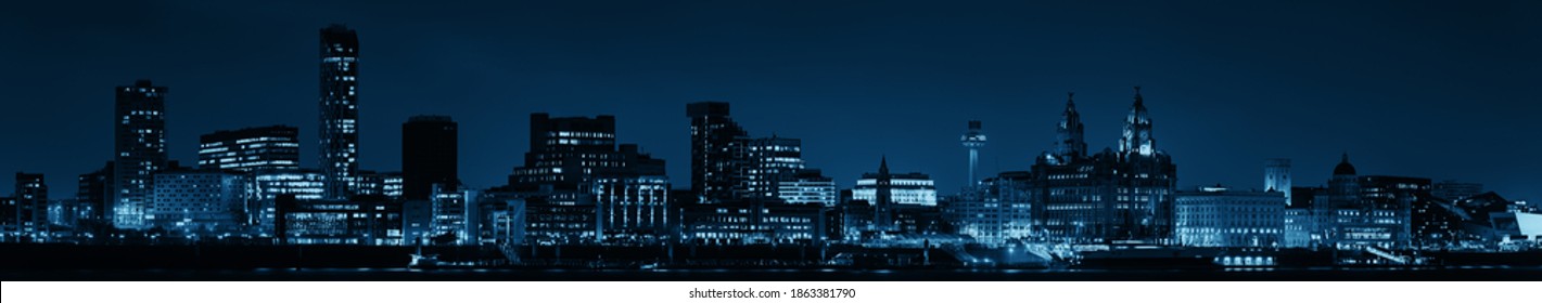 Liverpool skyline cityscape at night with buildings in England in United Kingdom