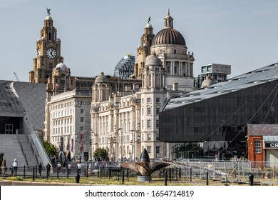 Liverpool, UK / 02 August 2019: Liverpool town hall, city hall, museum of liverpool and royal liver building from royal albert dock