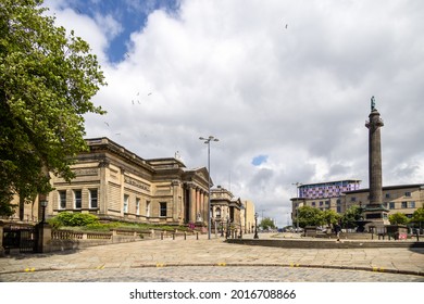 LIVERPOOL, UK - JULY 14 : Statue of the Duke of Wellington on a column outside County Sessions House in Liverpool, England UK on July 14, 2021. Unidentified people