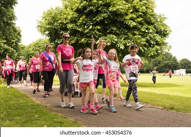 Liverpool, UK - June 26, 2016: Race for Life sponsored fun run for British charity Cancer Research UK. Groups and Family undertake their run or walk - Editorial