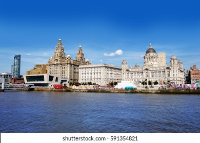 Liverpool waterfront with river Mersey and three graces
