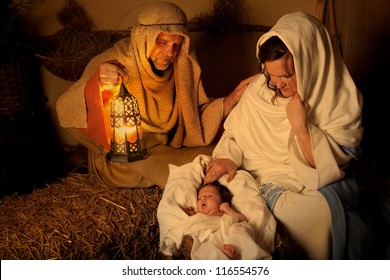 Living christmas nativity scene reenacted with a real 18 days old baby