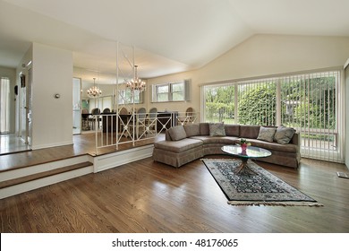 Living And Dining Room In Split Level Suburban Home