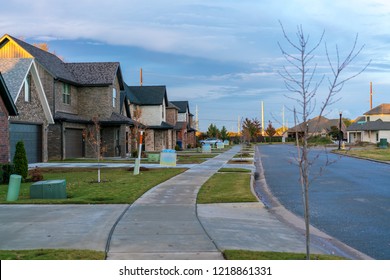 Living in Residential Housing Neighborhood Street at Sunset in Bentonville Arkansas - Powered by Shutterstock