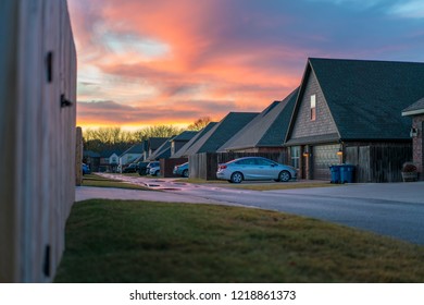 Living in Residential Housing Neighborhood Street at Sunset in Bentonville Arkansas - Powered by Shutterstock