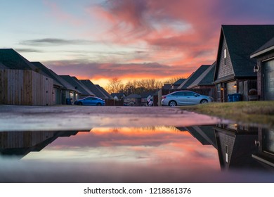 Living In Residential Housing Neighborhood Street At Sunset In Bentonville Arkansas