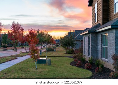 Living In Residential Housing Neighborhood Street At Sunset In Bentonville Arkansas