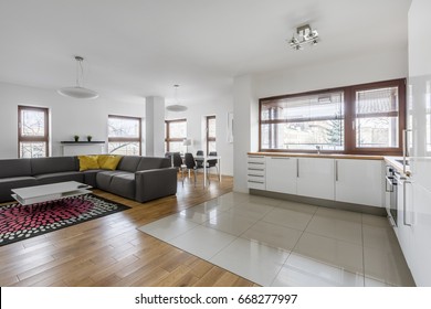 Living Room With High Gloss, White, Modern Kitchenette